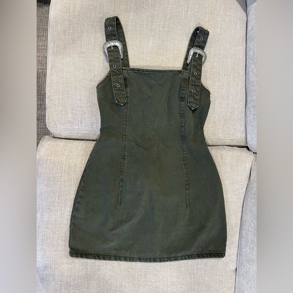 Zara women’s denim dress with buckle straps.